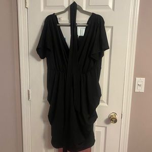 Plus size solid plunging neck belted dress